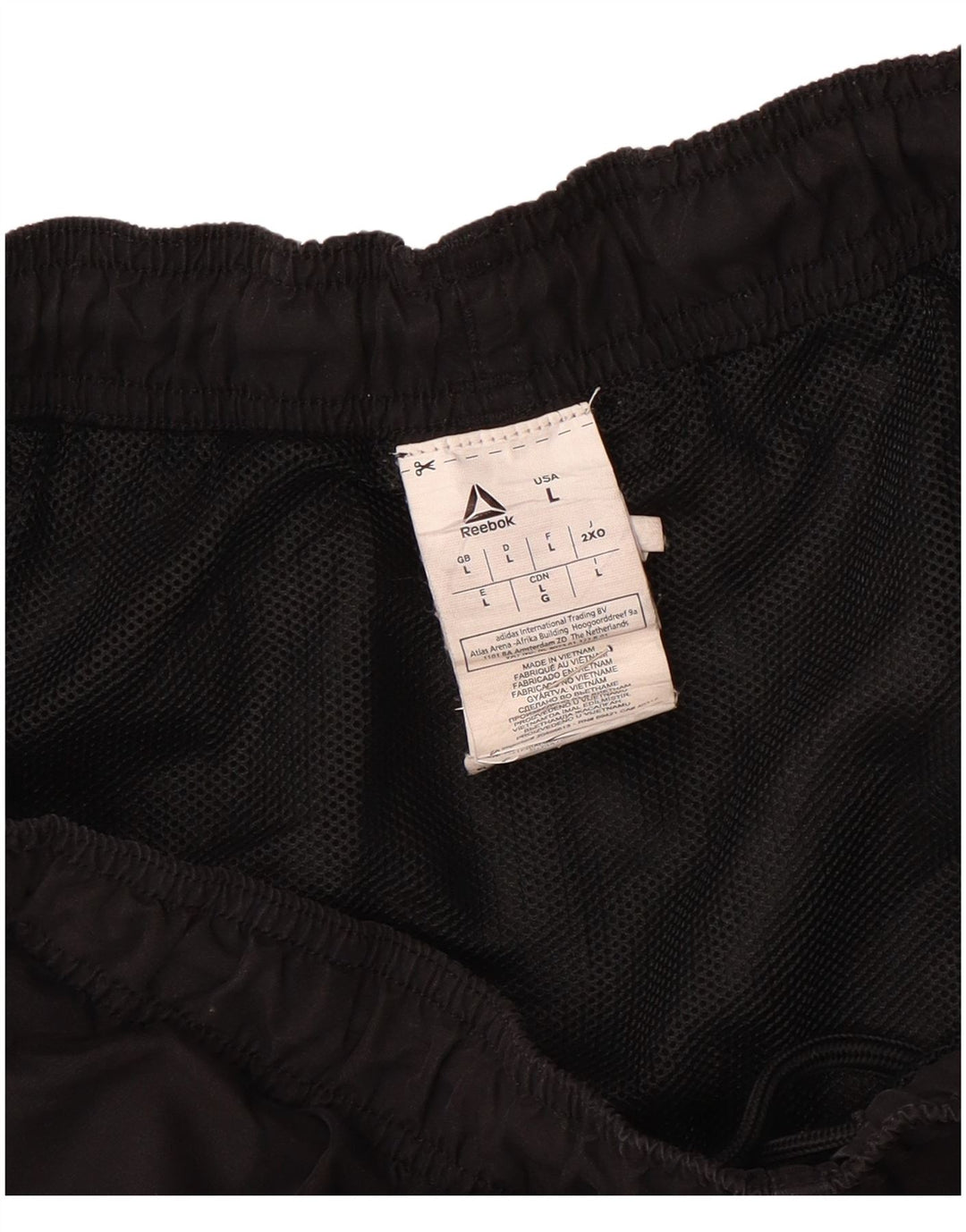 Reebok - Pantalones cortos deportivos para hombre, talla grande, poliéster negro