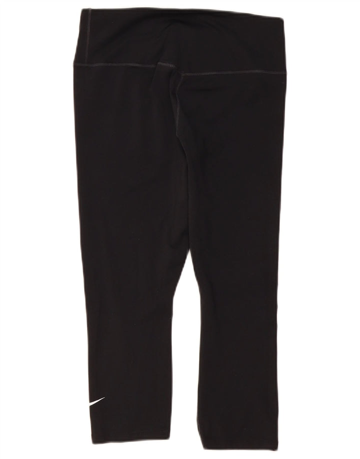 Nike - Leggings capri Dri Fit para mujer, talla M, color negro