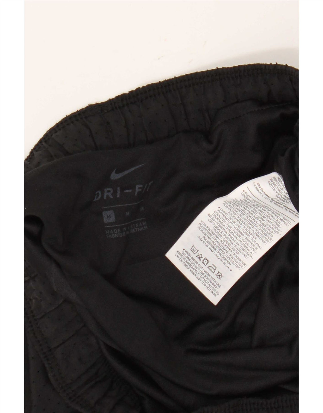Nike - Pantalones cortos deportivos Dri Fit para mujer, talla M, poliéster negro