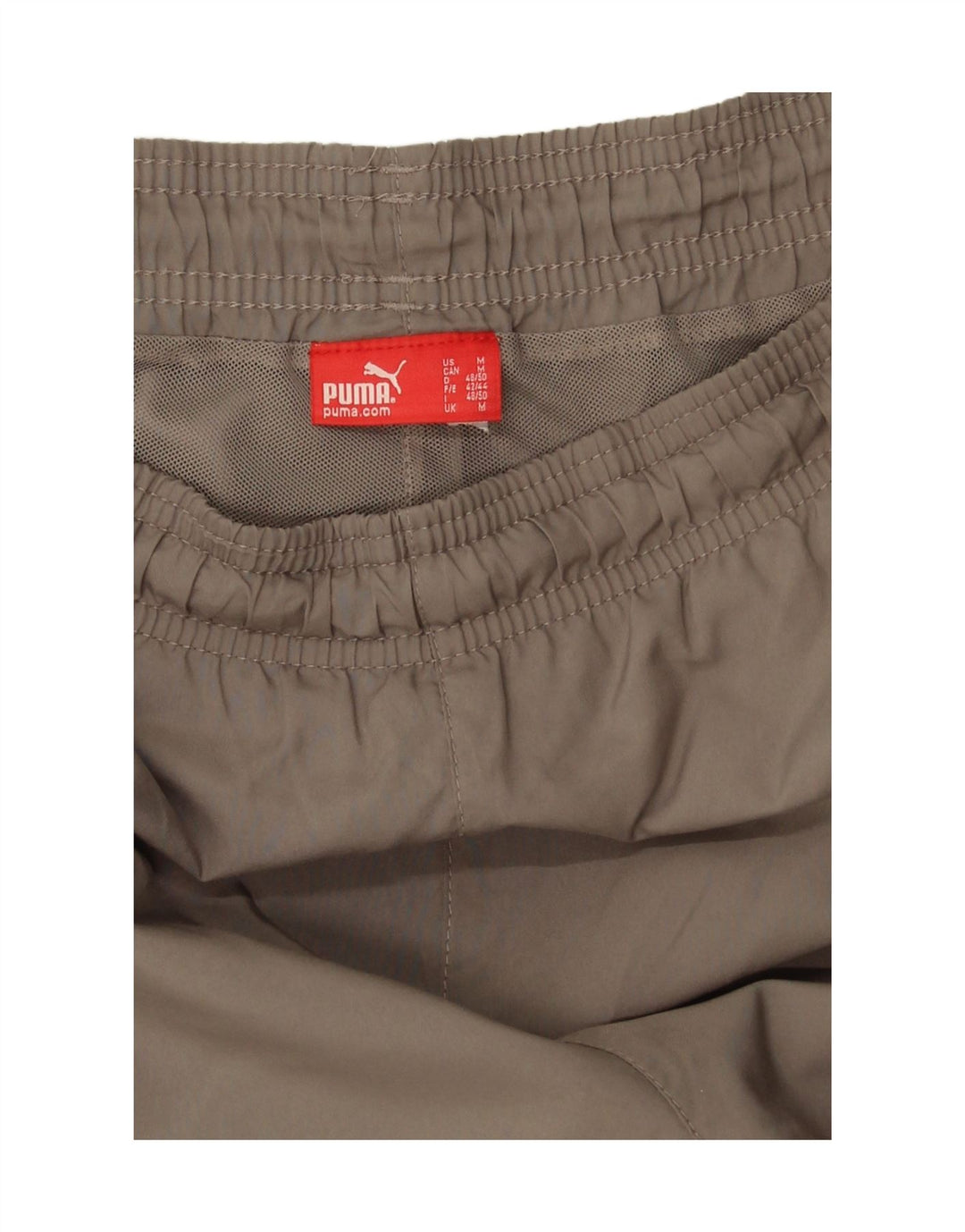 Pantalones cortos deportivos con gráficos Puma en marrón medio para hombre