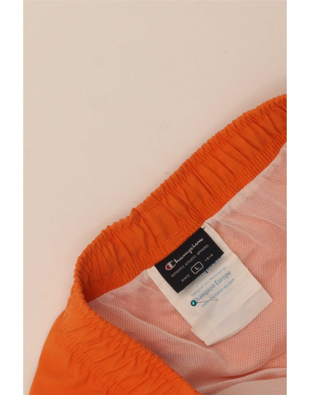 Champion Bañador con estampado gráfico para hombre, poliéster con bloques de color naranja grande