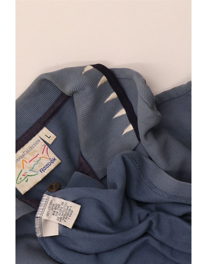 Reebok Polo gráfico para hombre de algodón azul grande