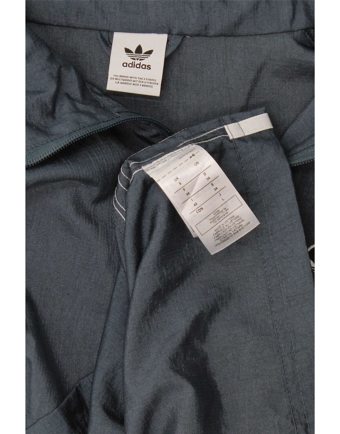 Adidas - Chaqueta utilitaria extragrande para mujer, talla 8, talla pequeña, poliamida azul