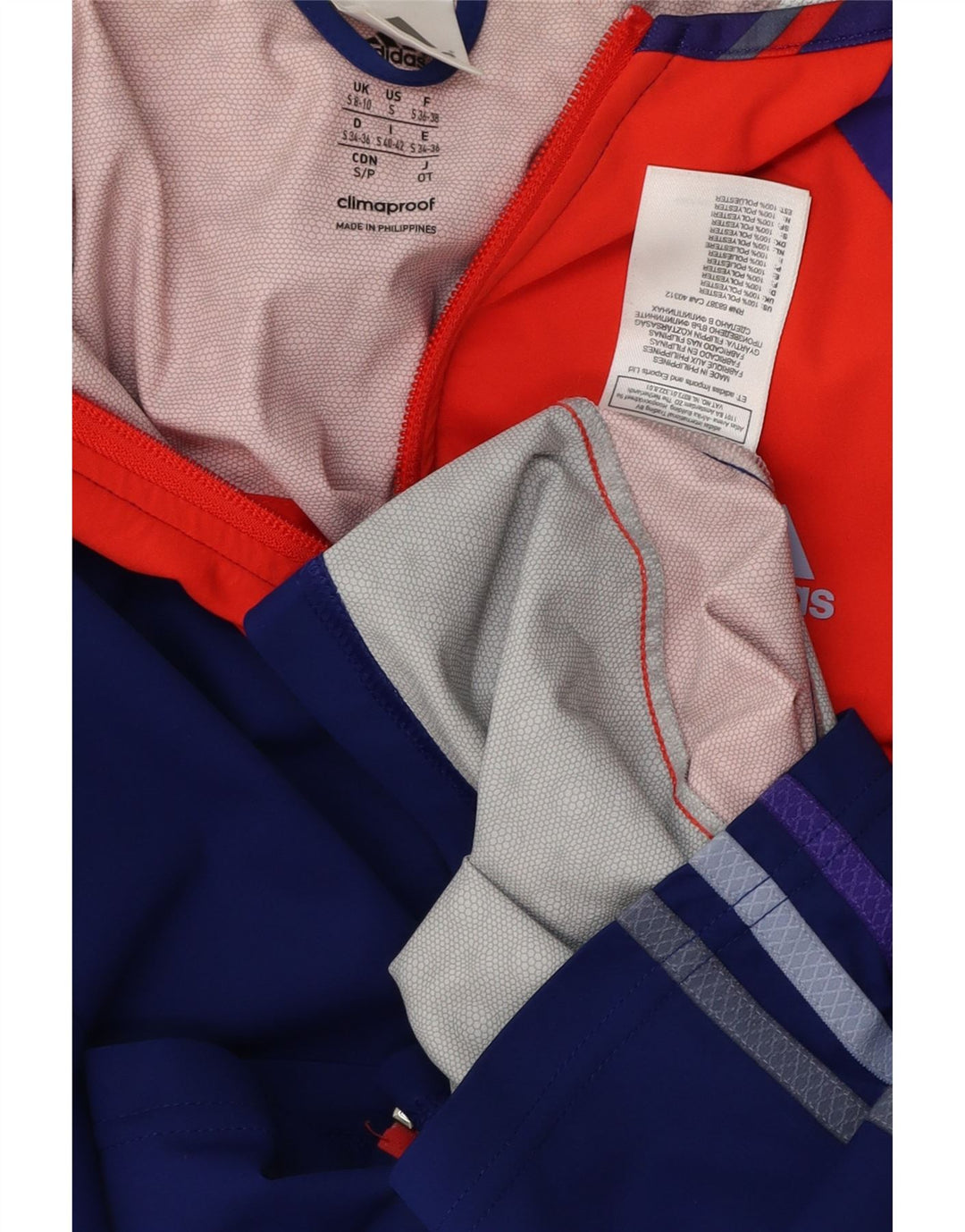 ADIDAS Chaqueta impermeable Clima Proof para mujer Reino Unido 8/10 Small Azul Colorblock