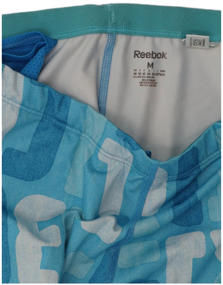 REEBOK Pantalones de chándal gráficos para mujer UK 40 Azul medio Colorblock
