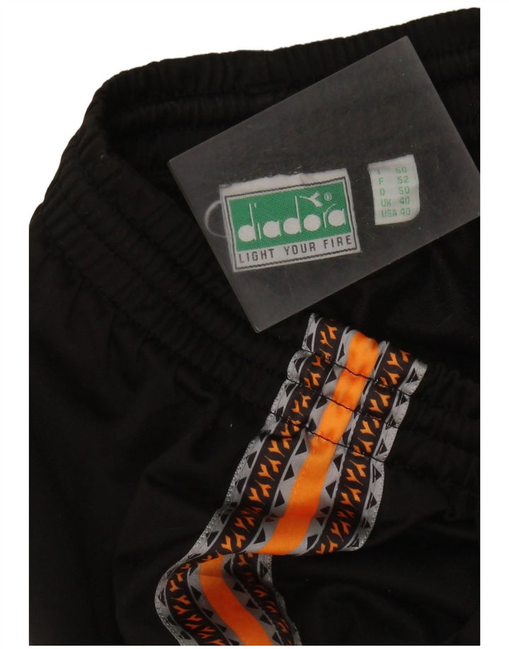 DIADORA Pantalón de chándal para hombre ES 40 Medium Negro Colorblock