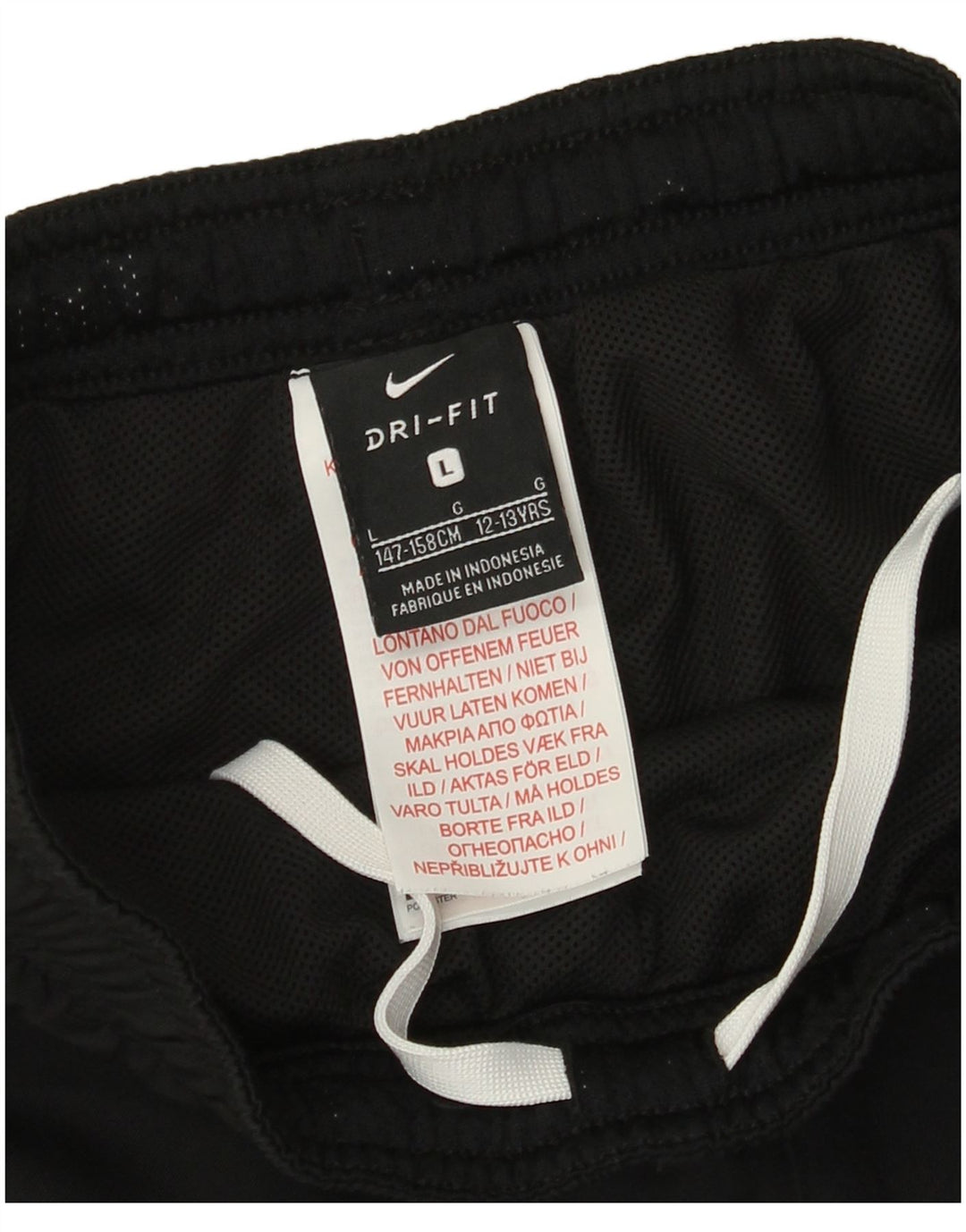 Nike Pantalones cortavientos Dri Fit para niños 12-13 años Grande Negro Poliéster