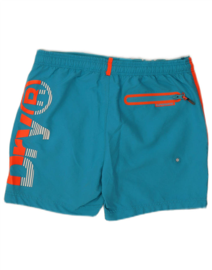 Superdry Bañador Graphic Regular para hombre con diseño color block en azul grande