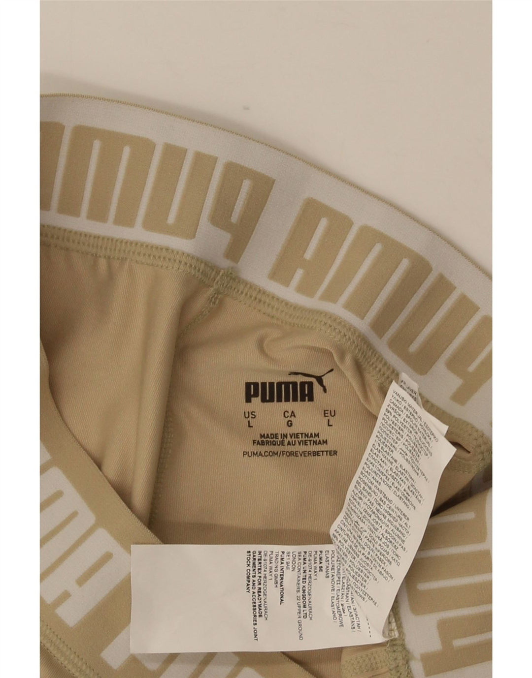 Puma - Pantalones cortos deportivos gráficos para mujer, talla 40, poliéster beige grande