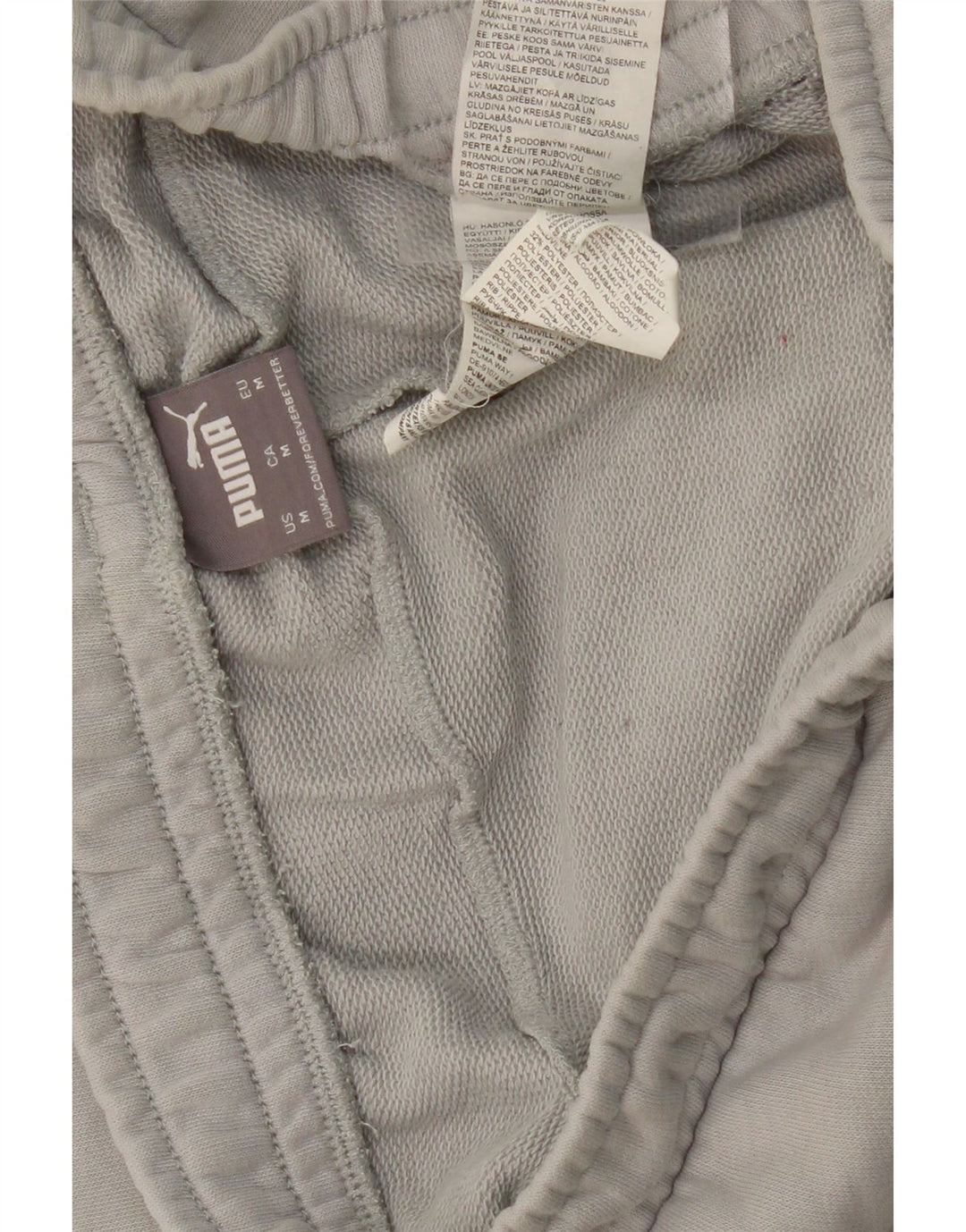 PUMA Pantalones de chándal con estampado gráfico Joggers gris medio color block