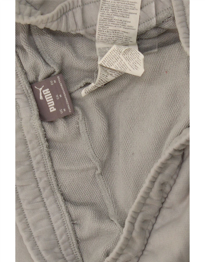 PUMA Pantalones de chándal con estampado gráfico Joggers gris medio color block