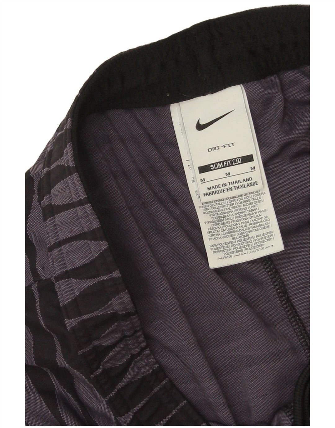 Nike - Pantalones cortos deportivos ajustados para hombre, color morado medio, poliéster geométrico