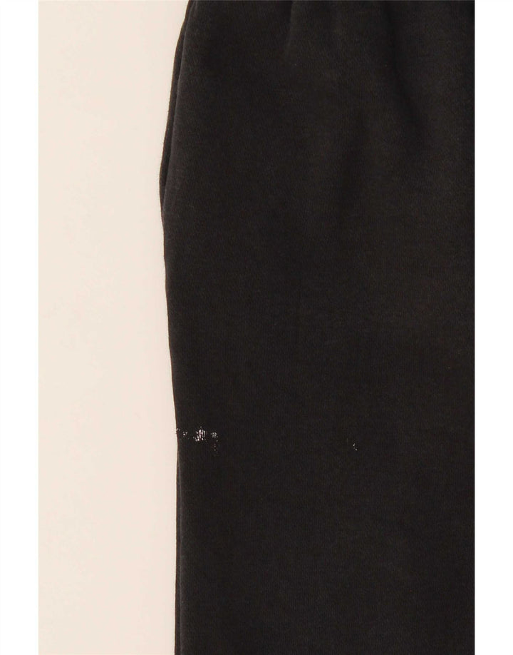 Nike Pantalones de chándal con gráfico para niños, 10-11 años, mediano, negro