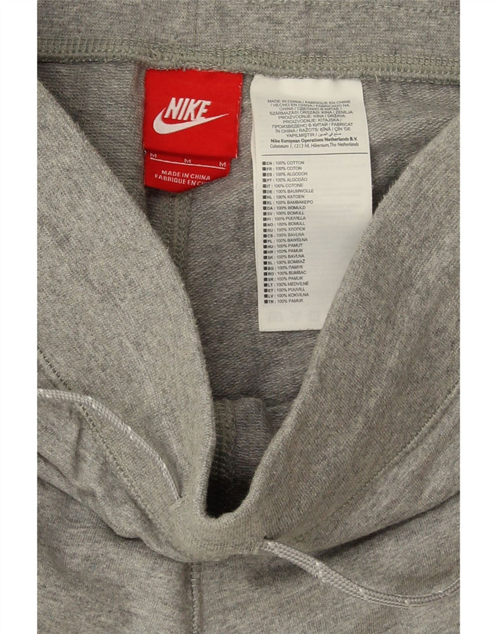 Nike - Pantalones de chándal para mujer, talla 40, algodón gris medio