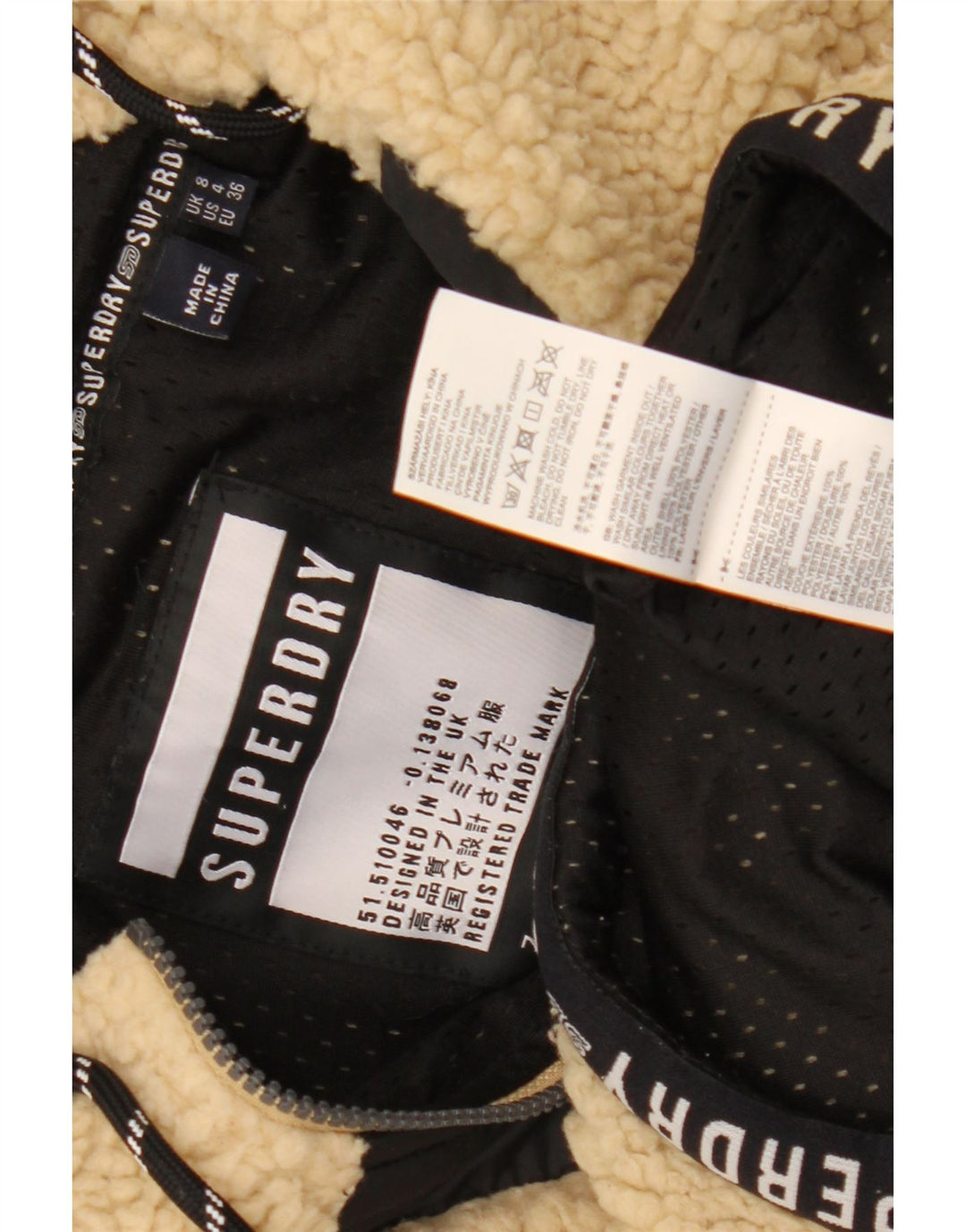 Superdry Jersey de forro polar con gráfico extragrande para mujer Reino Unido 8 Small Beige