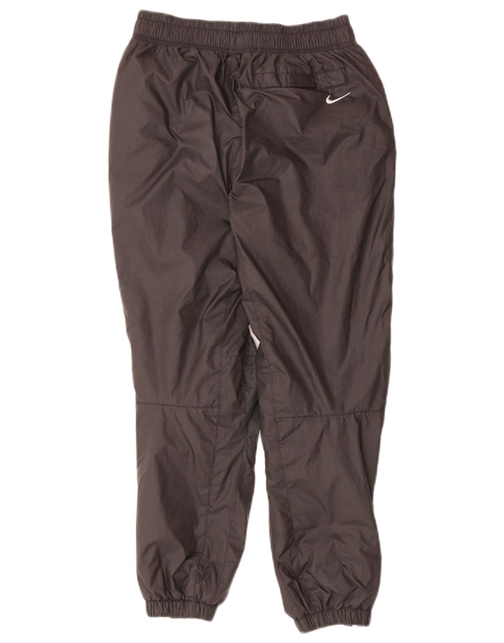 NIKE ACG Pantalones cortavientos Storm-Fit para niños 10-11 años Mediano Negro