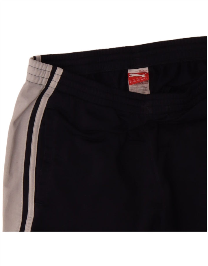 PUMA Pantalones de chándal para hombre Poliéster color block en azul marino mediano