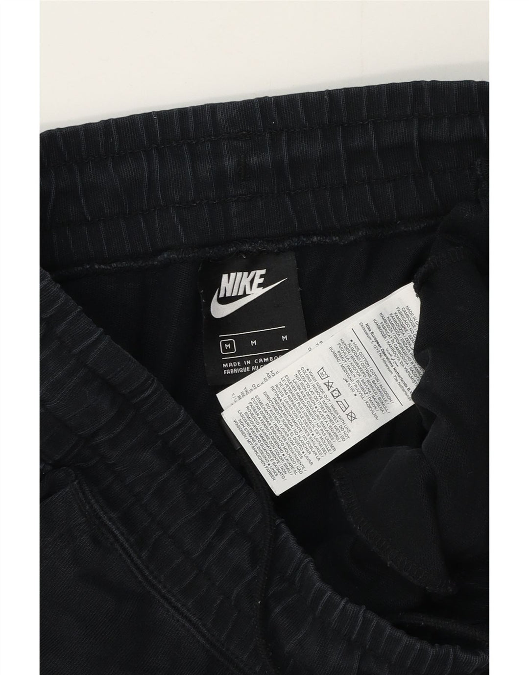 Nike - Pantalones de chándal para mujer, talla 40, talla mediana, color negro