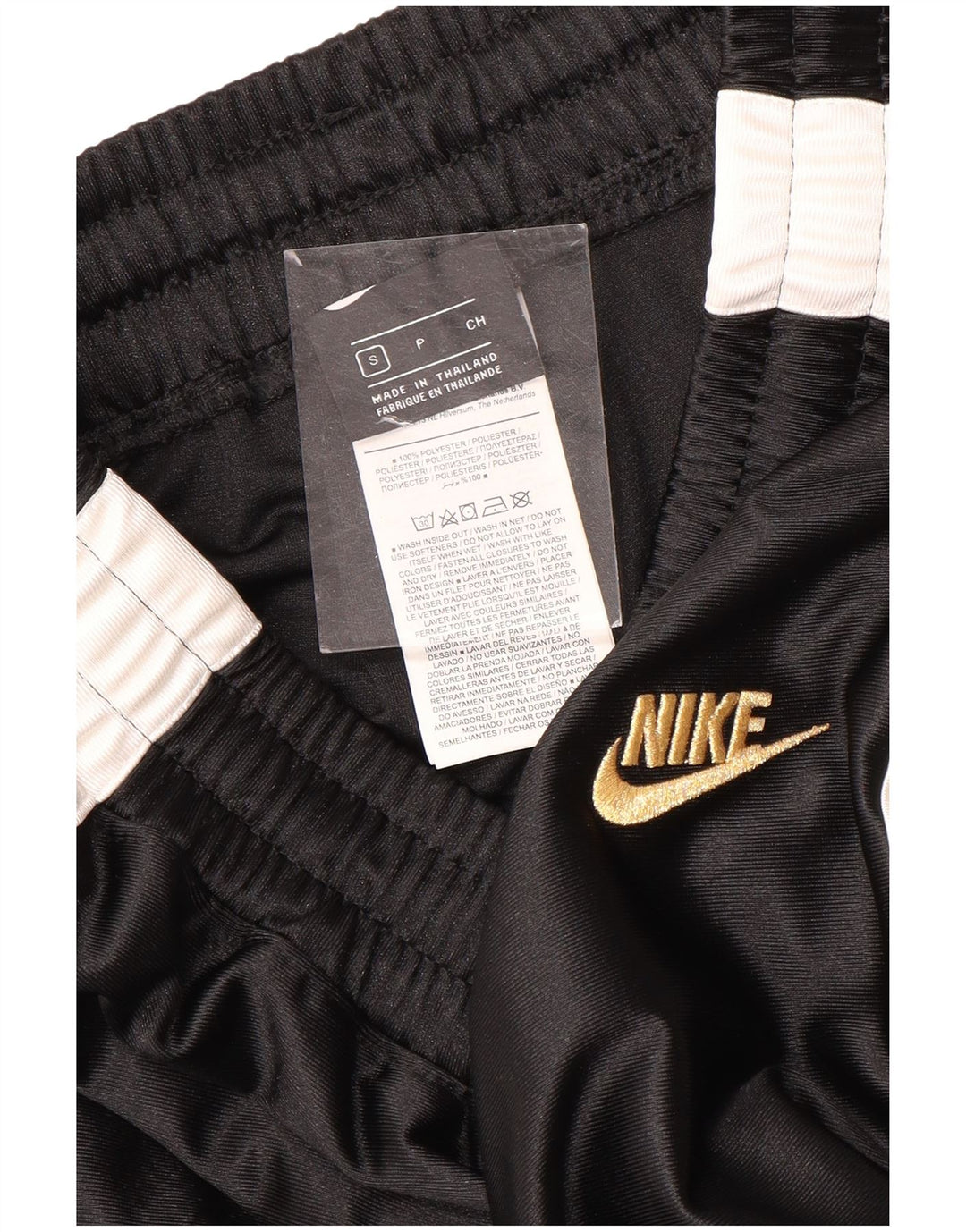 Nike - Pantalones de chándal para mujer (talla 40), color negro, poliéster