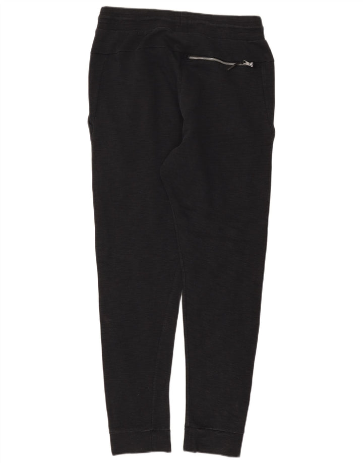 Nike - Pantalones de chándal para mujer, talla 40, color negro