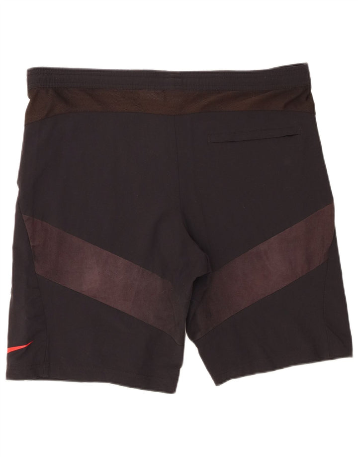 Pantalones cortos deportivos Nike de nailon color block en negro mediano para hombre
