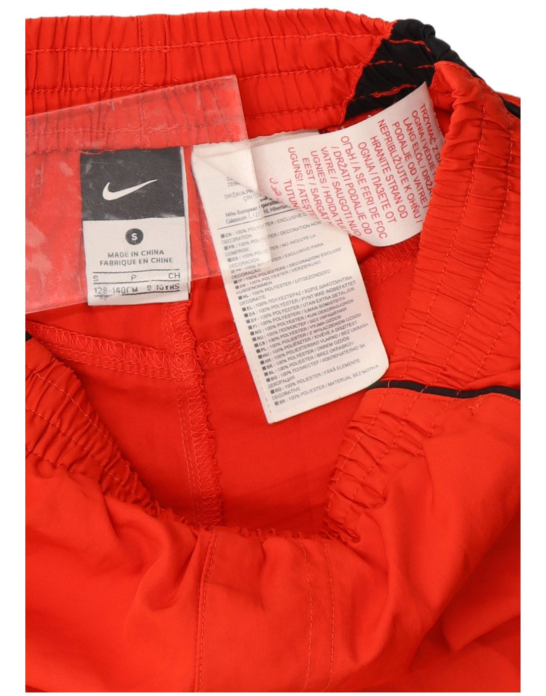 NIKE Pantalones cortos deportivos para niños 8-9 años Pequeño rojo Colorblock Poliéster