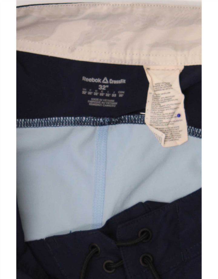 Reebok Bañador con estampado gráfico de nailon color block en azul medio