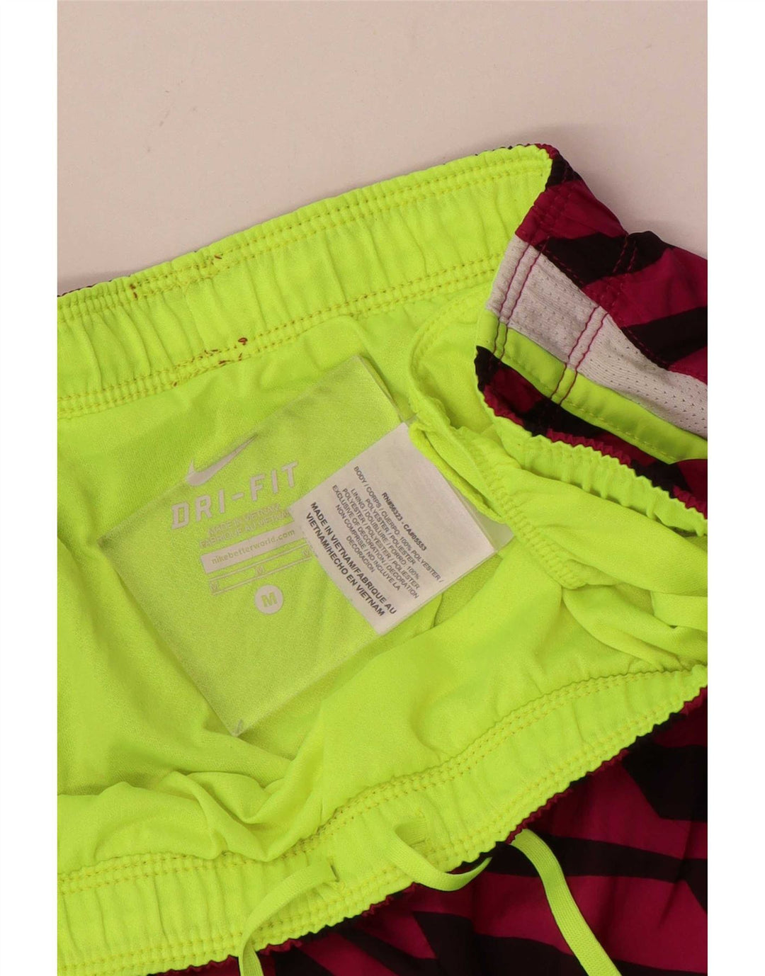 Nike - Pantalones cortos deportivos Dri Fit para mujer, talla 40, poliéster a rayas, color rosa medio
