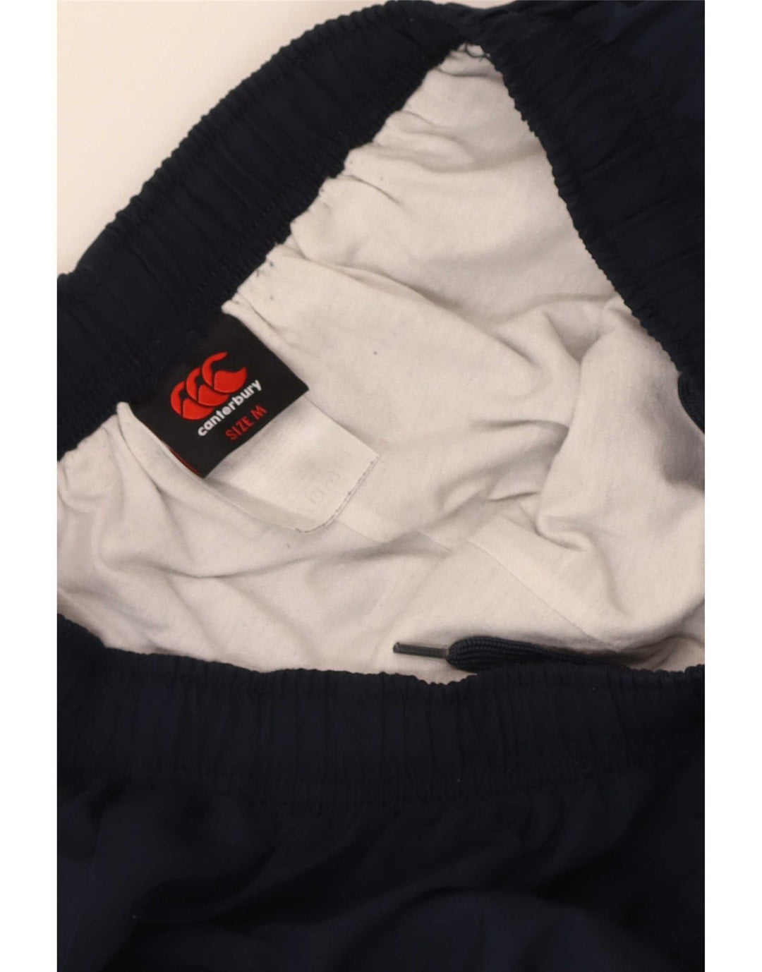 Canterbury Pantalones de chándal con estampado gráfico para hombre Poliéster azul marino medio