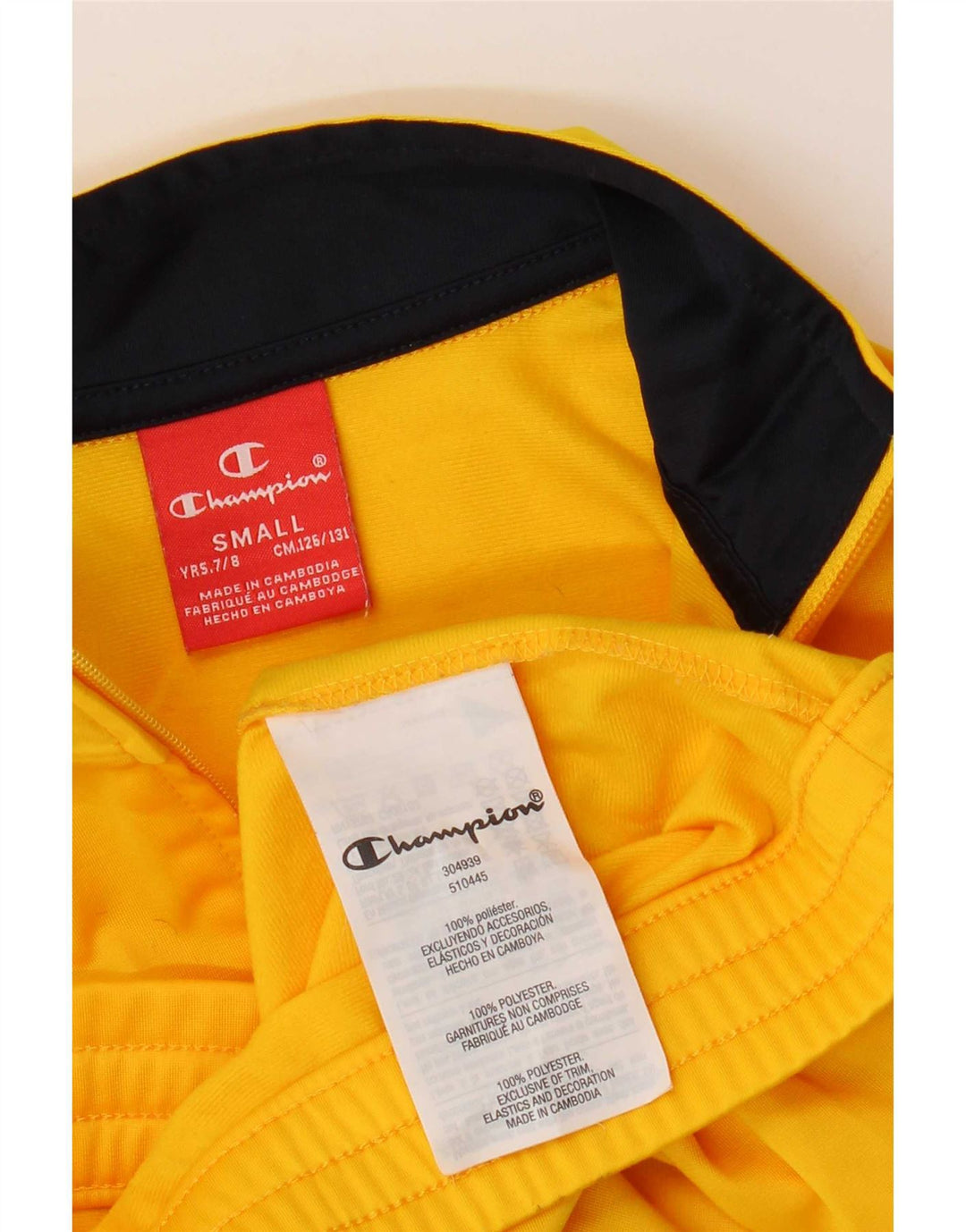 Champion Chaqueta de chándal gráfica para niños 7-8 años Poliéster amarillo pequeño