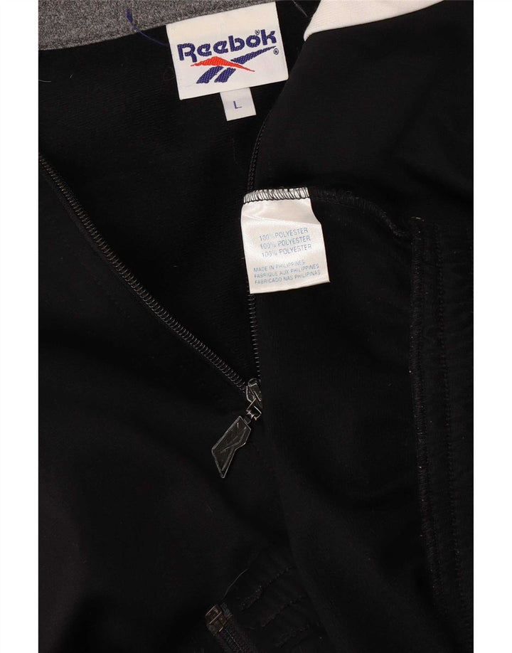 Chaqueta superior de chándal con gráfico Reebok para hombre, poliéster con bloques de color negro grande