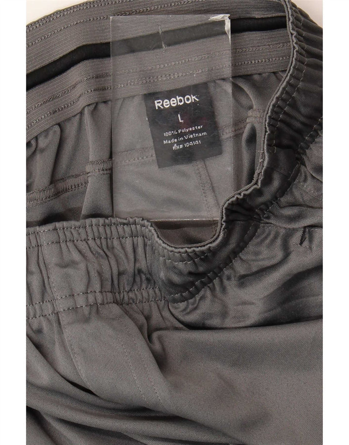 Reebok - Pantalones de chándal para mujer, talla 40, poliéster gris grande