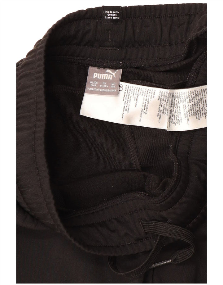 PUMA Pantalón de chándal para niño Joggers 11-12 años Negro Poliéster