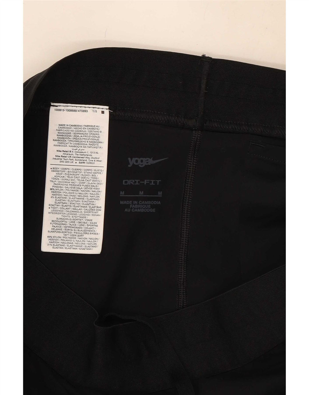 Nike - Pantalones cortos deportivos Dri Fit para mujer, talla M, nailon negro