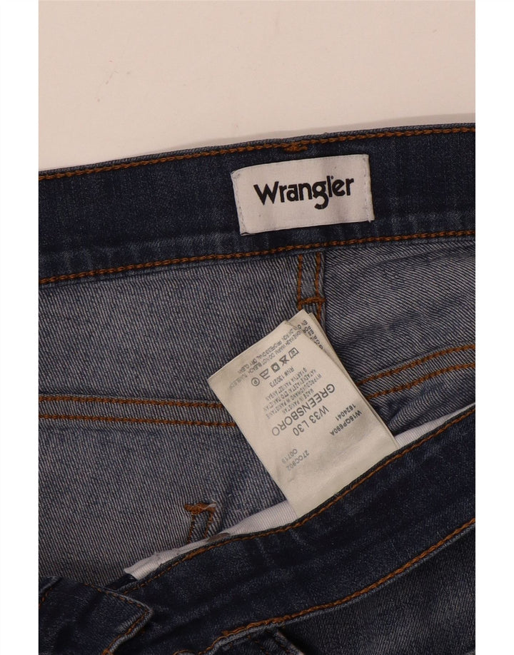 Vaqueros Wrangler Slim Greensboro para hombre W33 L30 Poliéster azul marino