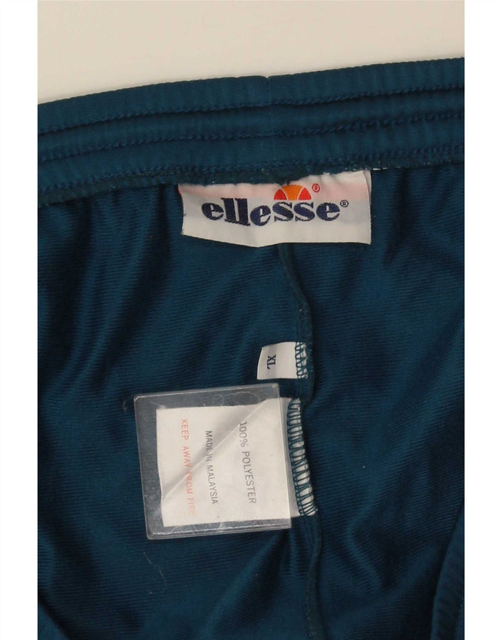 Ellesse Hombre Pantalones De Chándal Gráfico XL Poliéster Color Block Azul