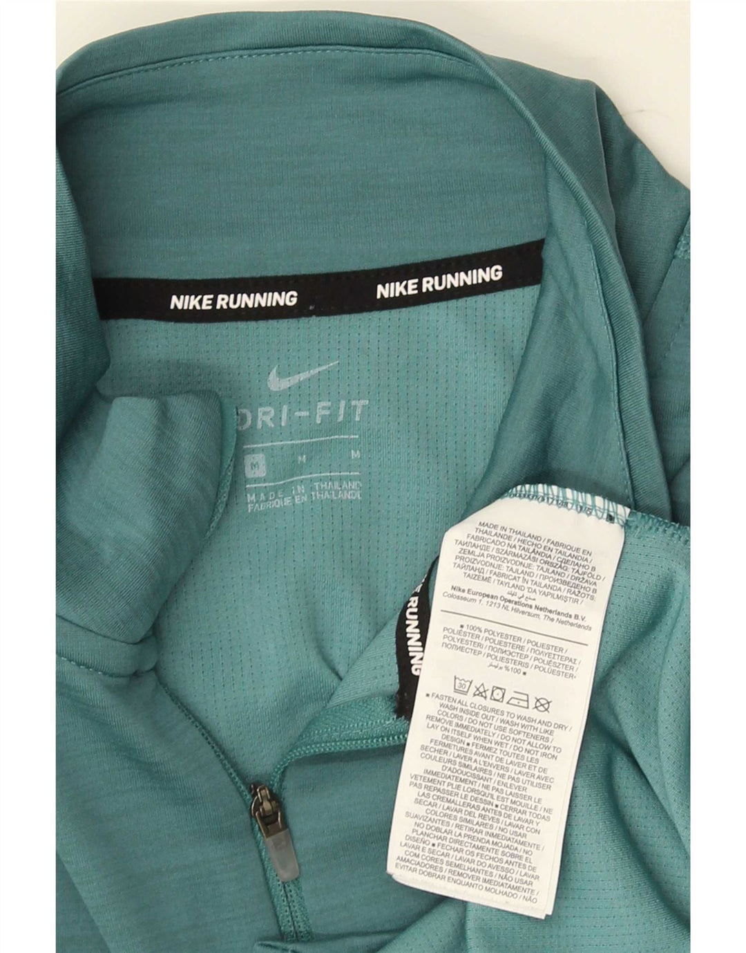 Nike Dri Fit Top gráfico con cremallera y cuello para hombre Manga larga Poliéster verde medio