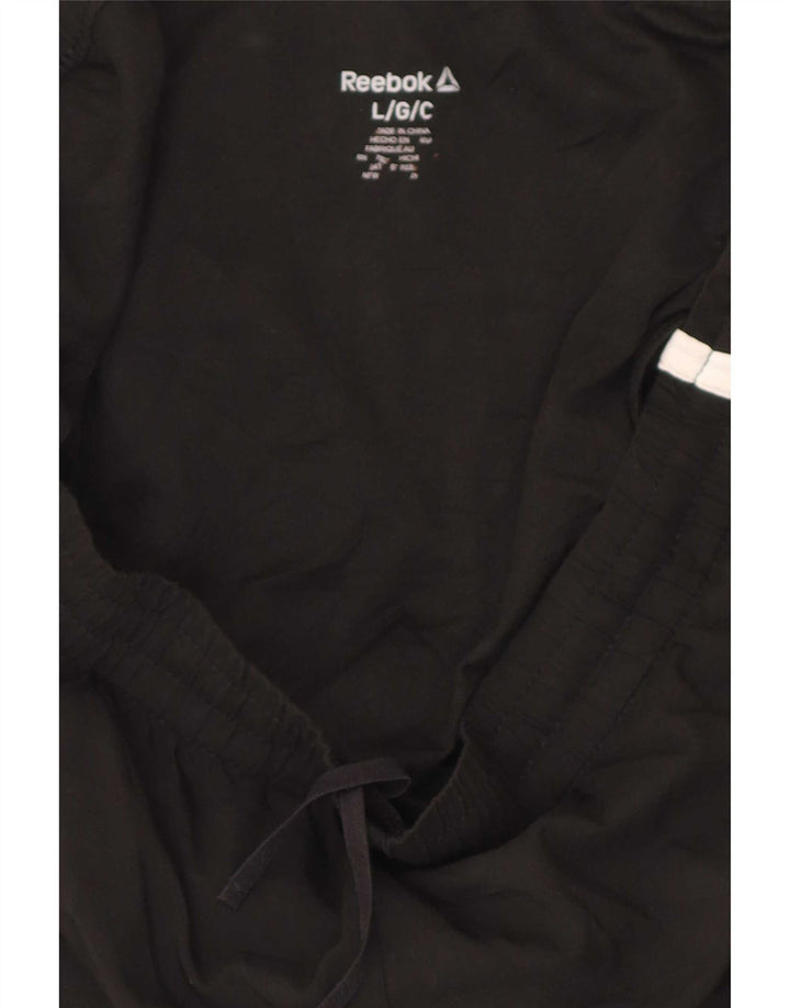 Pantalones cortos deportivos regulares Reebok para mujer, talla grande, color negro
