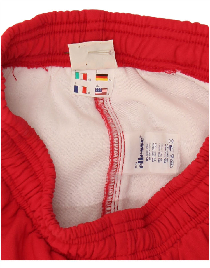 Ellesse Pantalones cortavientos con estribo para mujer US 6 Medium Red Nylon