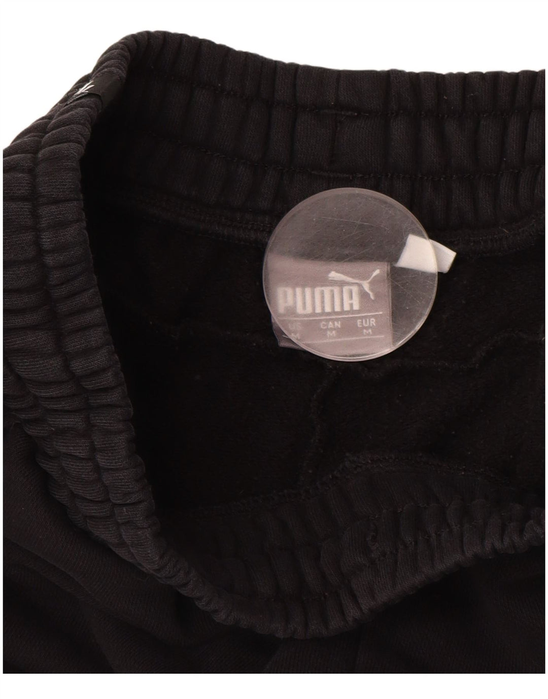 PUMA Pantalones de chándal con estampado gráfico Joggers Medium Black para hombre