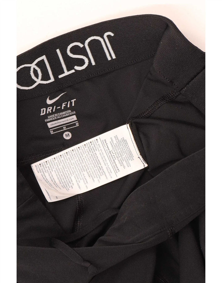 Nike - Leggings capri Dri Fit para mujer, talla M, color negro