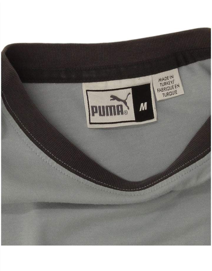 Puma Camiseta gráfica para mujer Top UK 44 Azul medio Colorblock