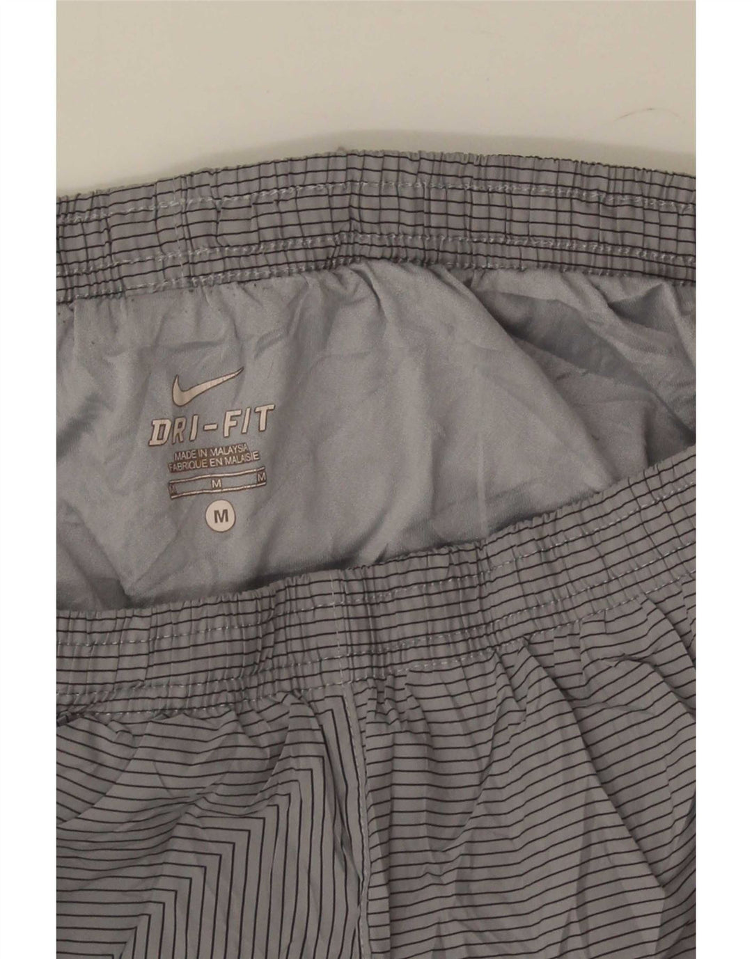 Pantalones cortos deportivos Nike Dri Fit para hombre gris medio color block