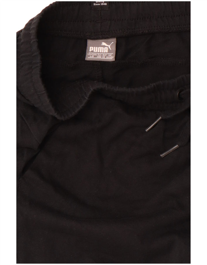PUMA Pantalones cortos deportivos con gráficos para niños 11-12 años Negro
