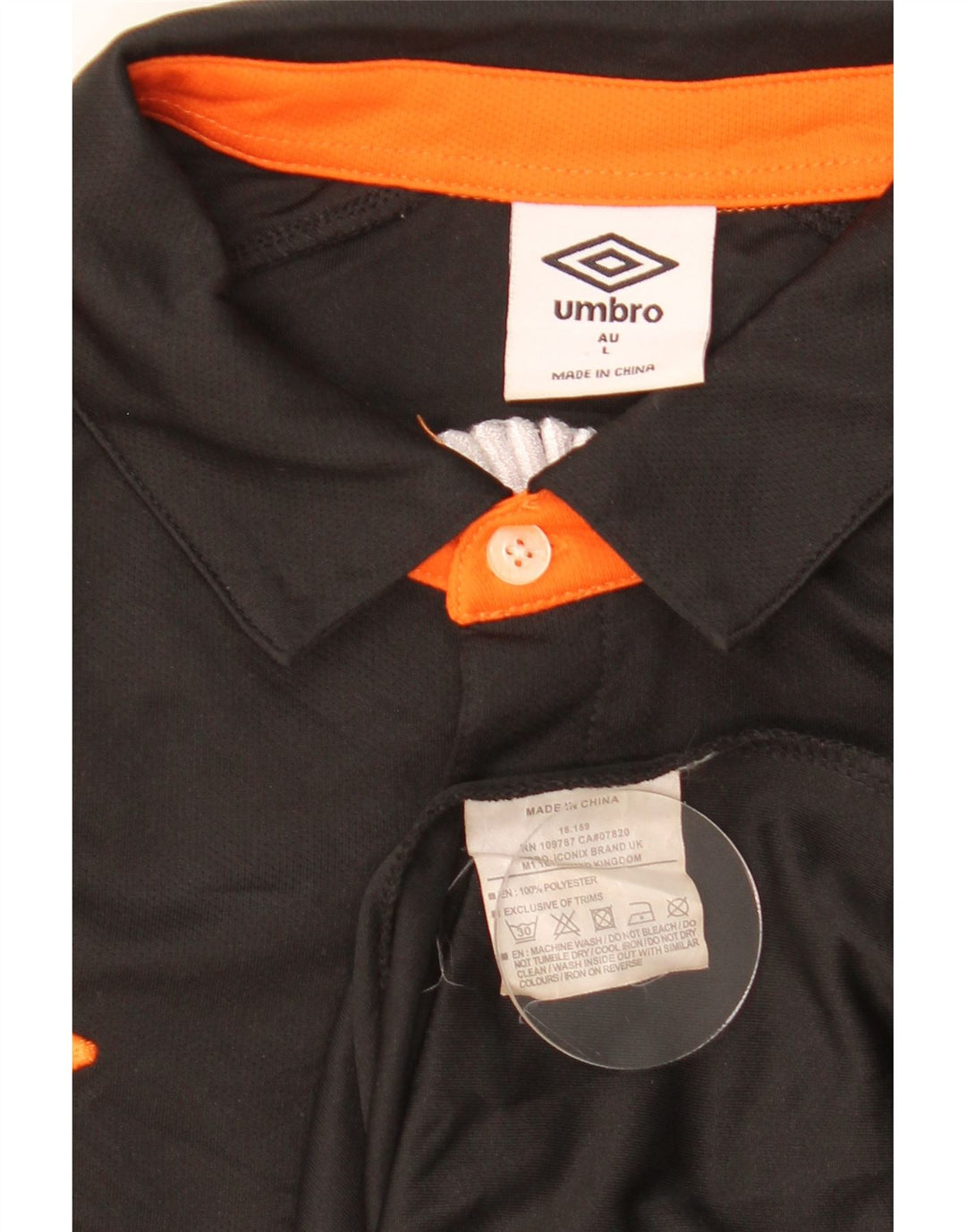 Umbro Polo con gráfico Spartans para hombre, poliéster color block negro grande
