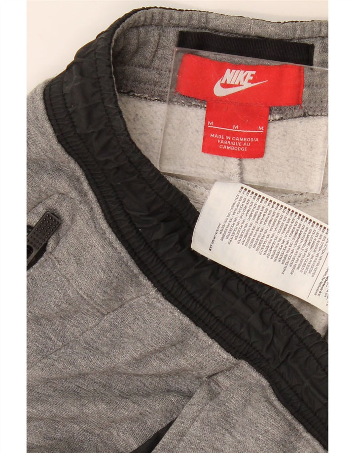 NIKE Hombre Pantalones de Chándal Joggers Gris Medio Algodón