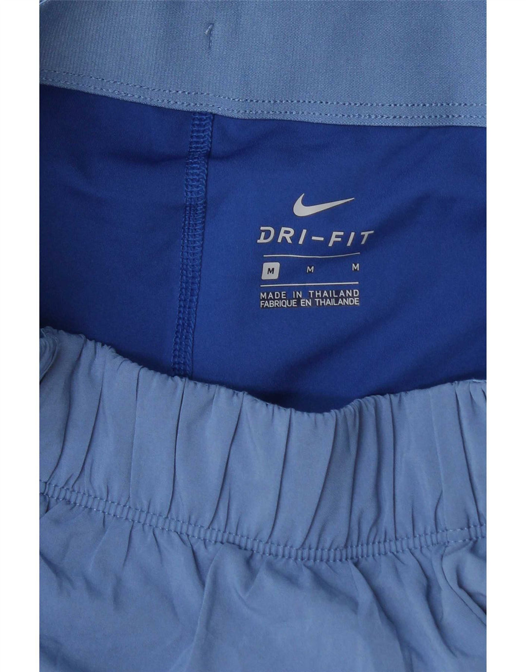 Nike - Pantalones cortos deportivos Dri Fit para mujer, talla 40, color azul medio