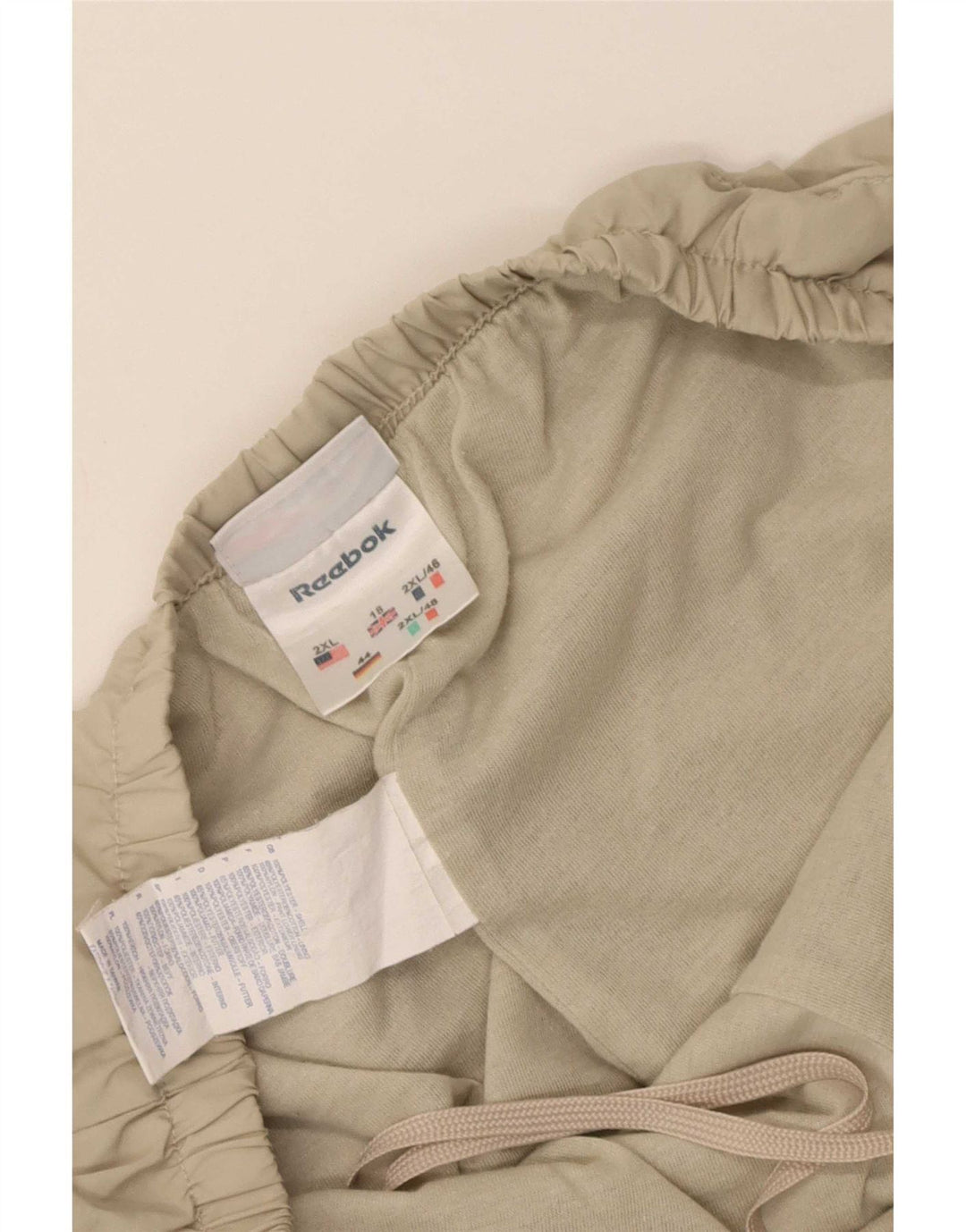 Reebok Pantalones de Chándal para Mujer ES 40 XL Beige Poliéster