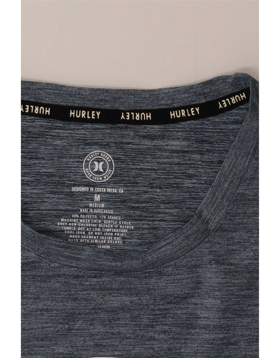 Hurley - Camiseta gráfica para hombre, parte superior mediana, poliéster moteado en azul marino