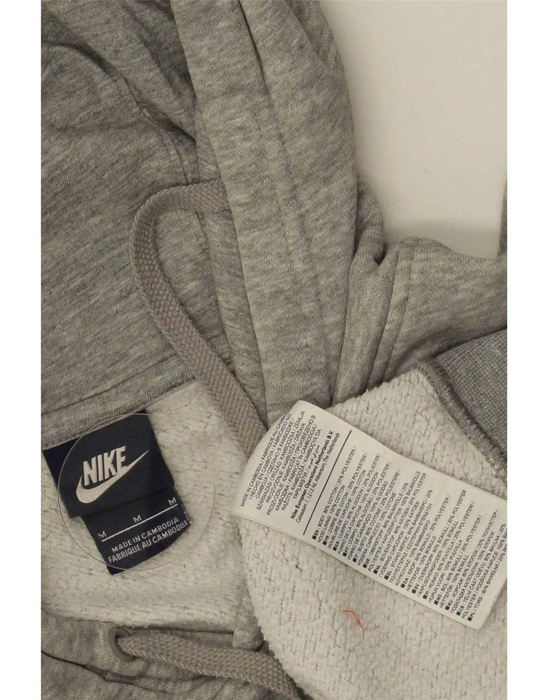 Nike Jersey con capucha y estampado gráfico de algodón moteado en gris medio